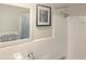Updated bathroom with white vanity, shower, and patterned floor at 11200 86Th Ave # 204, Seminole, FL 33772