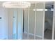 Dining area with mirrored wall and chandelier at 11200 86Th Ave # 204, Seminole, FL 33772