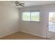 Bedroom with tile floors, window blinds, and sliding glass door to balcony at 11200 86Th Ave # 204, Seminole, FL 33772