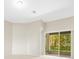 Living area with sliding doors leading to the backyard at 4264 Braemere Dr, Spring Hill, FL 34609