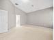 Primary bedroom with access to private bathroom and sliding glass doors at 4264 Braemere Dr, Spring Hill, FL 34609
