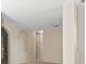 Spacious living room with high ceilings, neutral tones, and arched doorways at 4264 Braemere Dr, Spring Hill, FL 34609