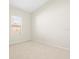 Bright bedroom featuring neutral walls and a large closet at 4264 Braemere Dr, Spring Hill, FL 34609