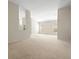 Spacious living room with neutral walls and carpet at 4264 Braemere Dr, Spring Hill, FL 34609