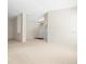 Open living area with neutral walls and carpeted floors at 4264 Braemere Dr, Spring Hill, FL 34609
