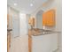 Modern kitchen with granite countertops and stainless steel appliances at 4264 Braemere Dr, Spring Hill, FL 34609