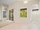 Bright dining area with tile flooring, sliding glass doors, and view to backyard at 4264 Braemere Dr, Spring Hill, FL 34609