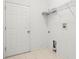 Laundry room with shelving and hookups for washer and dryer at 4264 Braemere Dr, Spring Hill, FL 34609