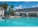 Resort-style pool with lounge chairs and a swim-up bar at 6109 Dusk Rose Ln, Brooksville, FL 34601