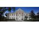 Elegant fitness center with columns and landscaping at night at 6109 Dusk Rose Ln, Brooksville, FL 34601