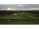 Panoramic view of the golf course during sunset at 6109 Dusk Rose Ln, Brooksville, FL 34601