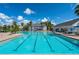 Resort-style pool with expansive sundeck and clubhouse at 6109 Dusk Rose Ln, Brooksville, FL 34601