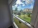 Window view of the canal and neighboring properties at 6428 Driftwood Dr, Hudson, FL 34667