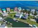 An aerial view of the property and surrounding waterfront community at 6428 Driftwood Dr, Hudson, FL 34667