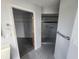 Bathroom with walk-in shower and ample closet space at 6428 Driftwood Dr, Hudson, FL 34667