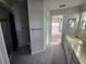 Bathroom features a shower, toilet and double vanity at 6428 Driftwood Dr, Hudson, FL 34667