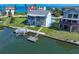 Two-story canal front home with private dock and water access at 6428 Driftwood Dr, Hudson, FL 34667