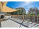 Spacious deck with shade sail, dining table, and grill at 313 Crystal Beach Ave, Crystal Beach, FL 34681