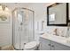 Clean bathroom with a walk-in shower and modern vanity at 313 Crystal Beach Ave, Crystal Beach, FL 34681