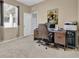 Home office features a desk, chair, and printer at 12847 Solola Way, Trinity, FL 34655