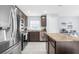 Modern kitchen featuring stainless steel appliances and granite countertops at 12894 Impatiens St, Spring Hill, FL 34609