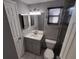 Updated bathroom with modern vanity and fixtures at 3544 Wilson Dr, Holiday, FL 34691