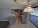 Bright kitchen boasts granite countertops, stainless steel appliances, and lots of cabinet space at 3544 Wilson Dr, Holiday, FL 34691