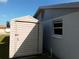 Exterior shed offering additional storage space at 3544 Wilson Dr, Holiday, FL 34691