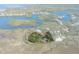 Aerial view showing property location and waterfront access at 8812 Camp Ln, Hudson, FL 34667