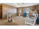Living room with wood paneling, fireplace, and hardwood floors at 8812 Camp Ln, Hudson, FL 34667
