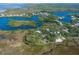 Aerial view showing home on a secluded island with water access at 8812 Camp Ln, Hudson, FL 34667