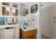 Bathroom with wood vanity and a walk-in shower at 8812 Camp Ln, Hudson, FL 34667