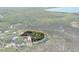 Aerial view highlighting property location and waterfront access at 8812 Camp Ln, Hudson, FL 34667