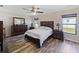 Spacious bedroom with a king-size bed and plenty of closet space at 12233 Pitcairn St, Brooksville, FL 34613