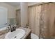 Bathroom with granite countertop and updated vanity at 12233 Pitcairn St, Brooksville, FL 34613