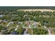 Wide shot of the property and surrounding neighborhood at 12233 Pitcairn St, Brooksville, FL 34613