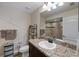 Clean bathroom with granite vanity and shower/tub combo at 12233 Pitcairn St, Brooksville, FL 34613