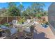 Charming backyard patio with table and chairs, ideal for outdoor dining at 12233 Pitcairn St, Brooksville, FL 34613