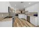 Modern kitchen with stainless steel appliances and breakfast nook at 12233 Pitcairn St, Brooksville, FL 34613