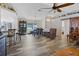 Open concept kitchen with island and view to living room at 12233 Pitcairn St, Brooksville, FL 34613