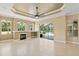 Bright living room featuring a fireplace and sliding glass doors at 5027 Gevalia Dr, Brooksville, FL 34604