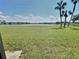 Scenic view of a tranquil lake from the property at 11120 Carriage Hill Dr # 2, Port Richey, FL 34668