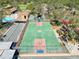 Community basketball court with painted lines and hoop at 7518 Mediterranean Ct, Hudson, FL 34667