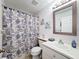 Bathroom with a shower and single vanity at 7518 Mediterranean Ct, Hudson, FL 34667