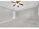 Spacious bedroom with ceiling fan and tile flooring at 2209 Utopian E Dr # 109, Clearwater, FL 33763