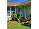 Well-maintained exterior with attractive landscaping at 8535 Bella Via, Hudson, FL 34667