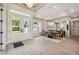 Elegant dining room featuring a large table and statement chandelier at 6406 Summit View Dr, Brooksville, FL 34601