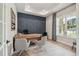Spacious home office with large window and geometric wall at 6406 Summit View Dr, Brooksville, FL 34601