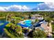 Community pool, clubhouse, and lush landscaping at 6406 Summit View Dr, Brooksville, FL 34601