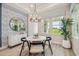 Breakfast nook features stylish wallpaper and large windows at 6406 Summit View Dr, Brooksville, FL 34601